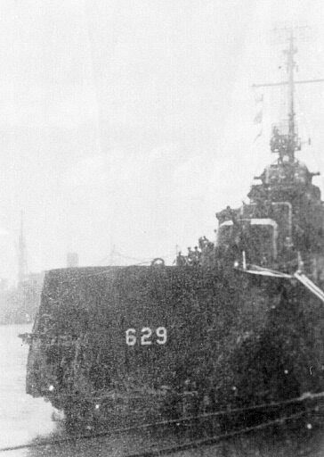 At pier in Pearl Harbor, bow on; 19OCT1943.