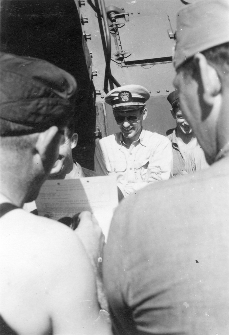 T. Westbrook (Davey Jones), reading the riot act to J. S. C. Gabbert (senior shellback); 25DEC1943.