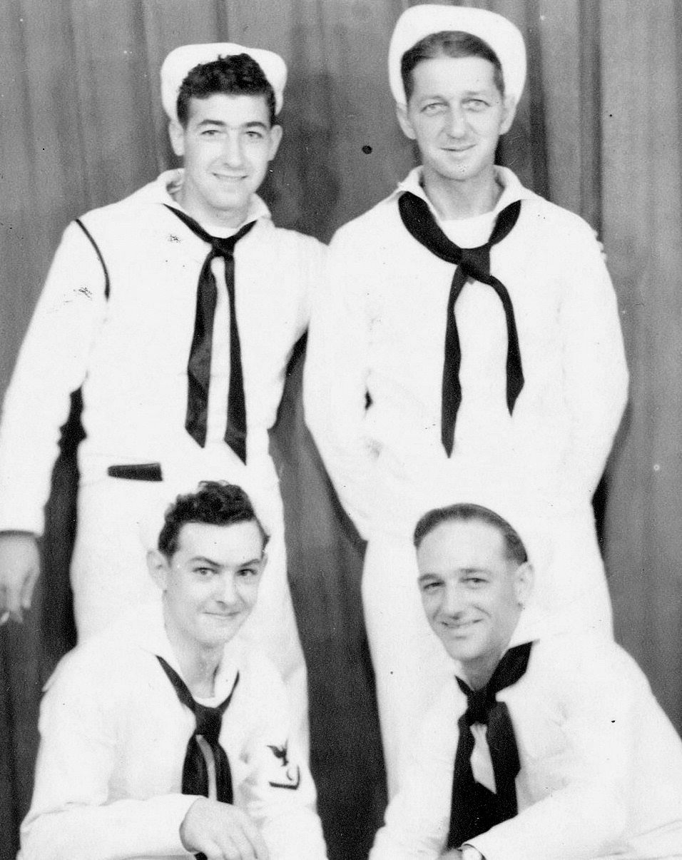 Supply Dept.<br>BACK ROW (L→R) E. Pelletier, [unknown].<br>FRONT ROW (L→R) R. Pelletier, [unknown].