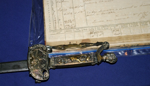 sword and logbook