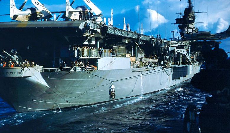 Highline to aircraft carrier Randolph (CV 15)